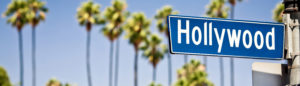 Hollywood boulevard sign, with palm trees in the background